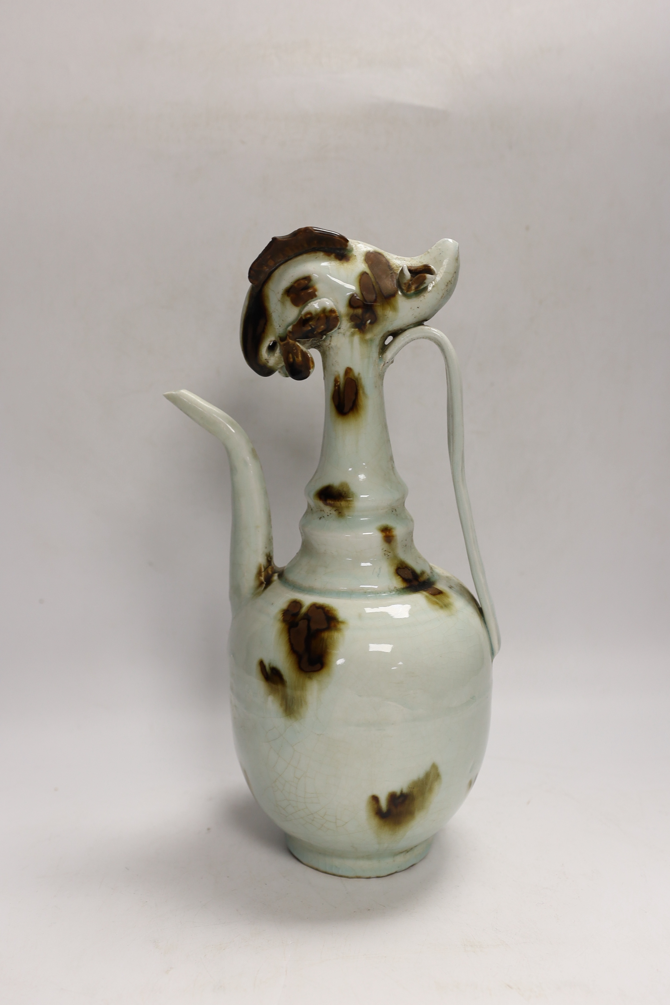 A Chinese longquan chicken head wine ewer, 30cm